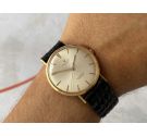 N.O.S. UNIVERSAL GENEVE Vintage Swiss hand winding watch 18K YELLOW GOLD Cal. 215 Ref. 10373/1 *** NEW OLD STOCK ***