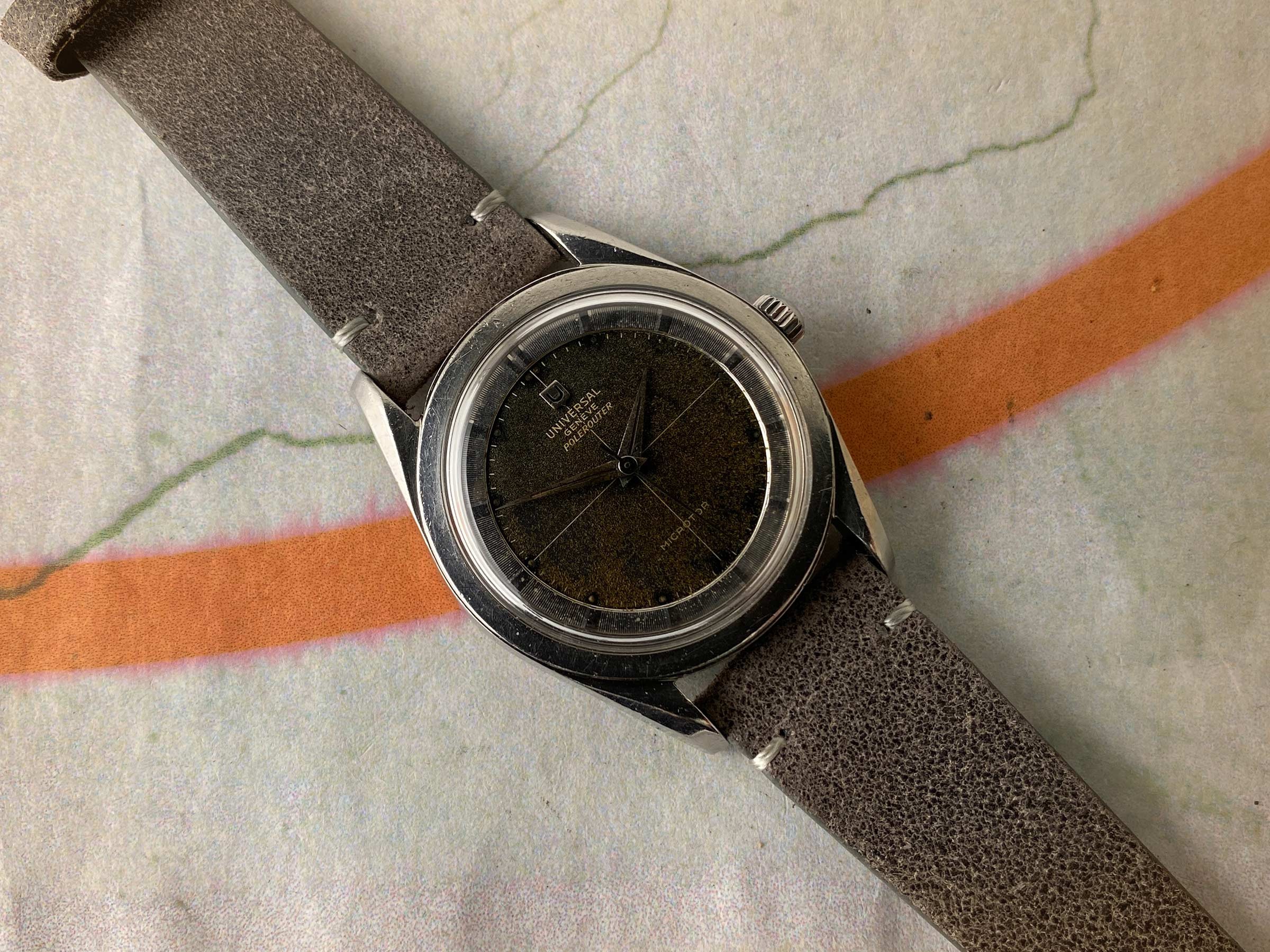 UNIVERSAL GENEVE POLEROUTER 1957 Ref. 20360-1 Reloj suizo vintage automático 28 JEWELS Cal. 215 MICROTOR *** TROPICALIZADO ***