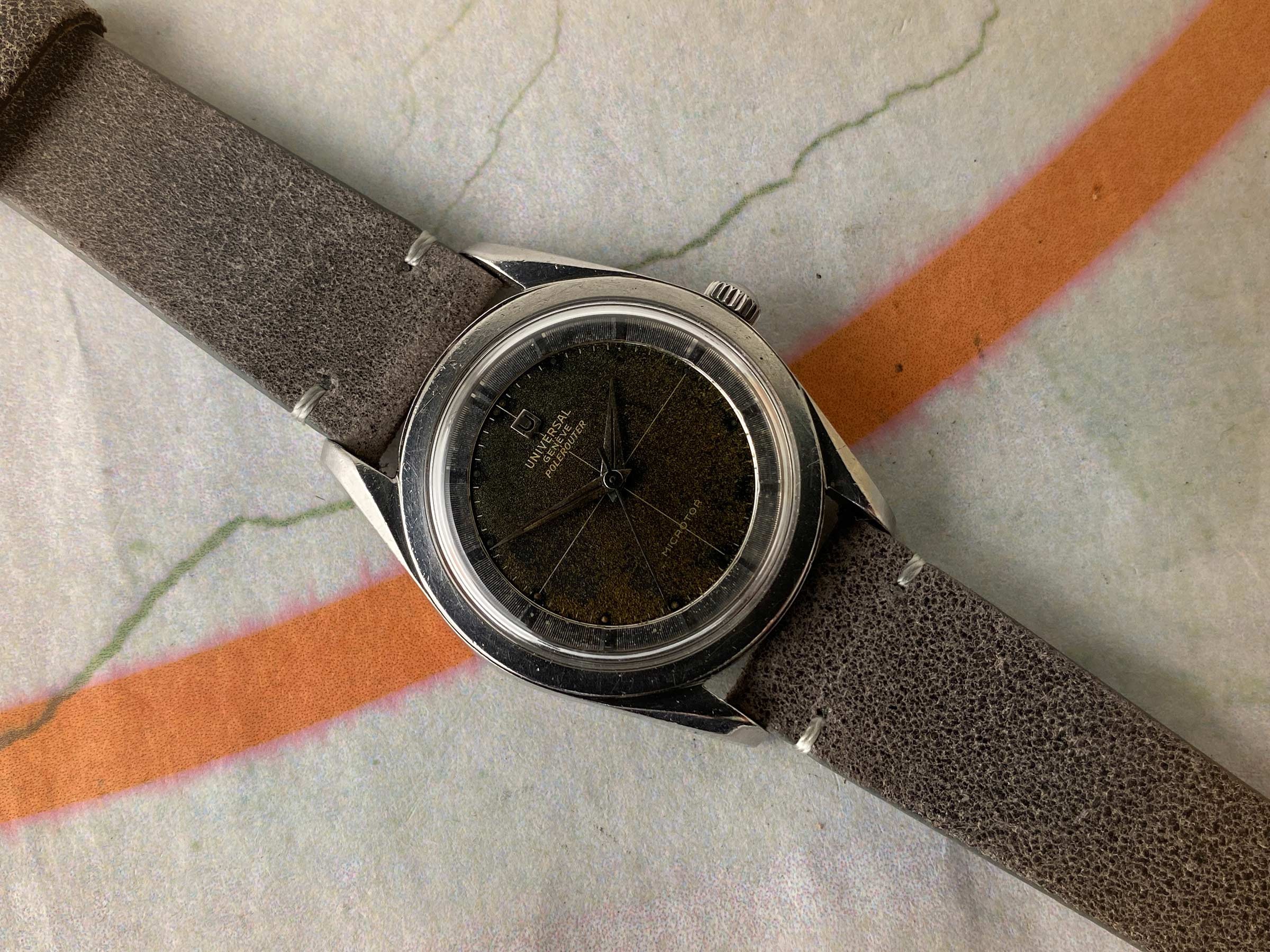 UNIVERSAL GENEVE POLEROUTER 1957 Ref. 20360-1 Reloj suizo vintage automático 28 JEWELS Cal. 215 MICROTOR *** TROPICALIZADO ***