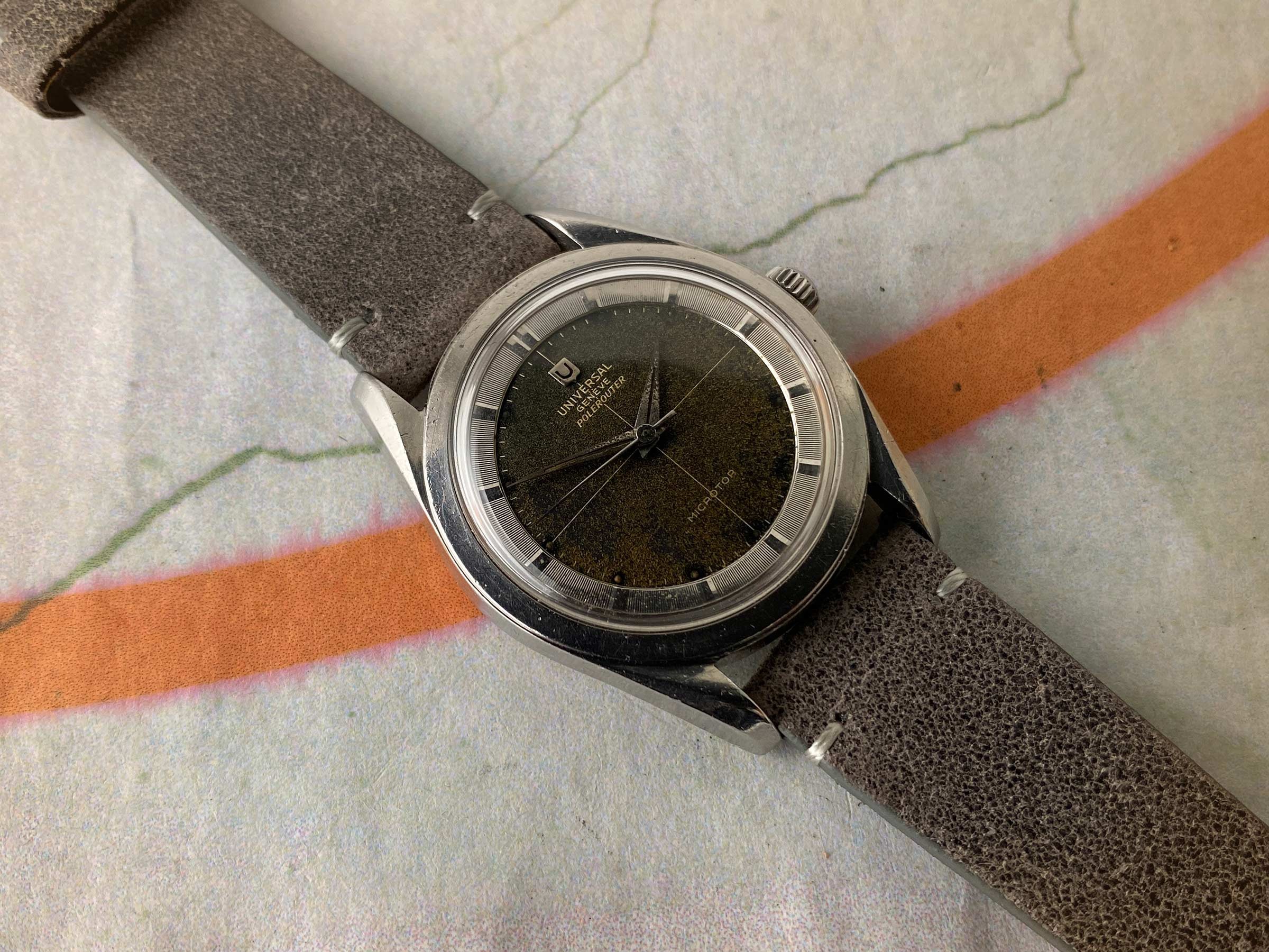 UNIVERSAL GENEVE POLEROUTER 1957 Ref. 20360-1 Reloj suizo vintage automático 28 JEWELS Cal. 215 MICROTOR *** TROPICALIZADO ***