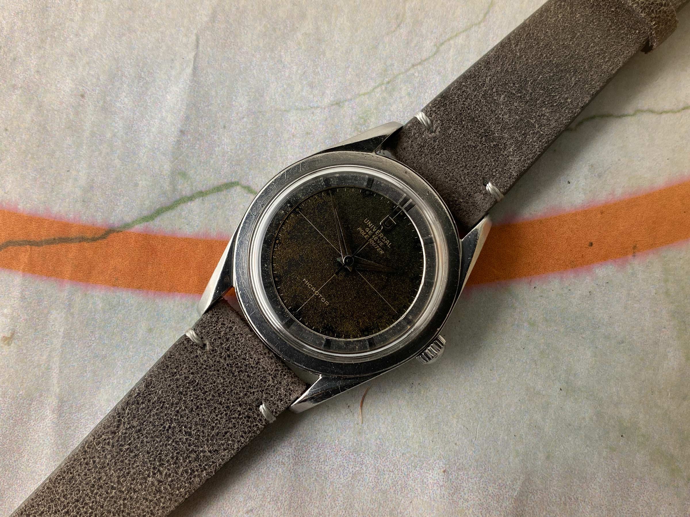 UNIVERSAL GENEVE POLEROUTER 1957 Ref. 20360-1 Reloj suizo vintage automático 28 JEWELS Cal. 215 MICROTOR *** TROPICALIZADO ***