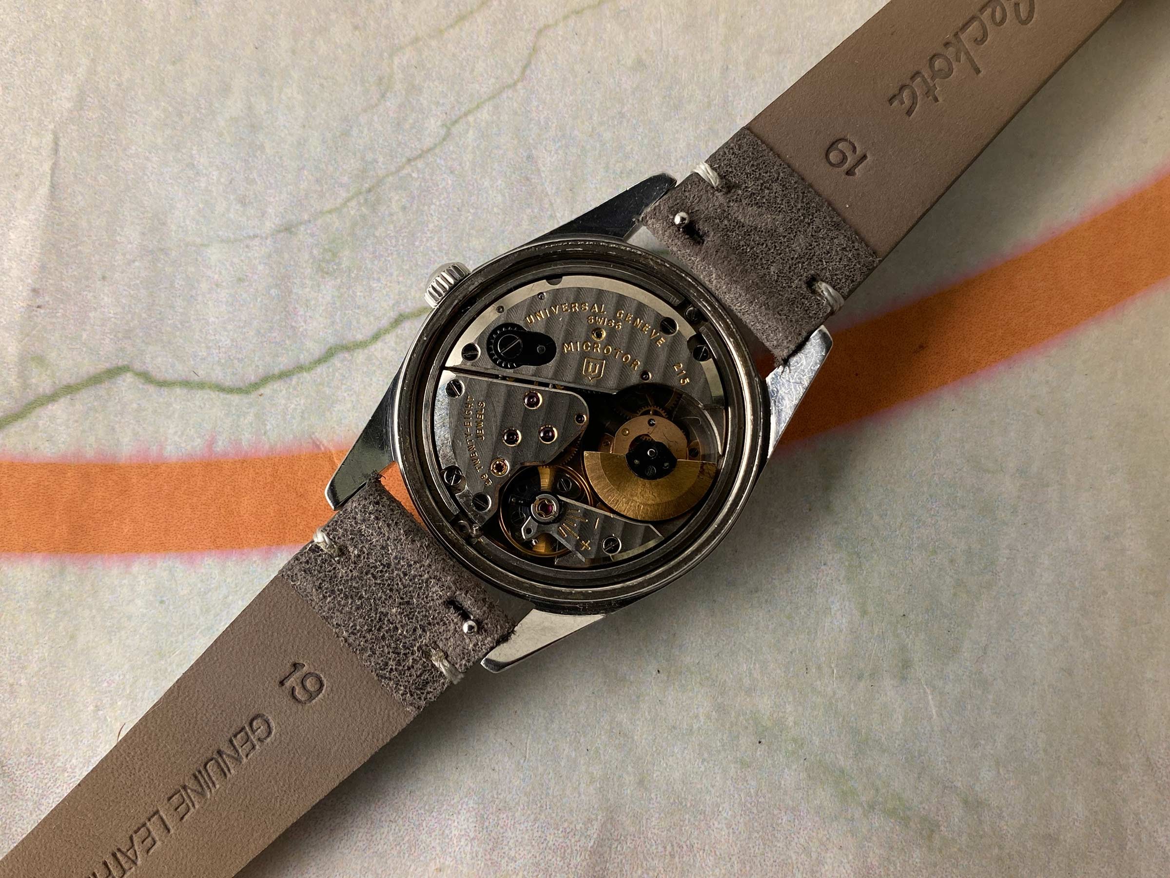 UNIVERSAL GENEVE POLEROUTER 1957 Ref. 20360-1 Reloj suizo vintage automático 28 JEWELS Cal. 215 MICROTOR *** TROPICALIZADO ***
