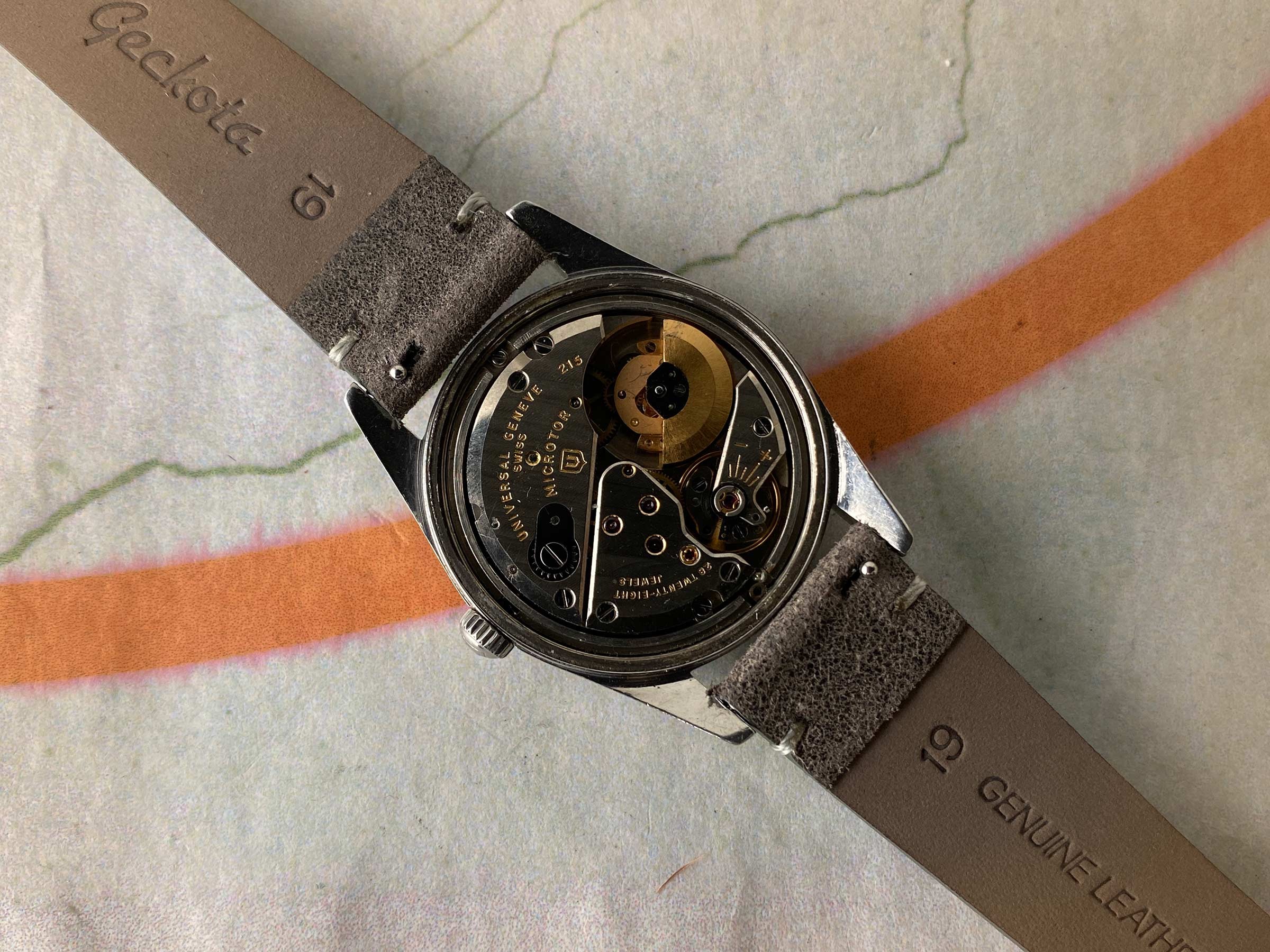 UNIVERSAL GENEVE POLEROUTER 1957 Ref. 20360-1 Reloj suizo vintage automático 28 JEWELS Cal. 215 MICROTOR *** TROPICALIZADO ***